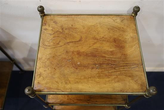 A pair of early 20th century tubular brass and walnut three tier etageres, W.1ft 3in. D.1ft 1in. H.2ft 4in.